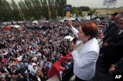 FILE - Meral Aksener. a former Interior minister, addresses supporters as riot police sealed off a hotel to prevent thousands of dissidents from holding a party congress in Ankara, Turkey, May 15, 2016.