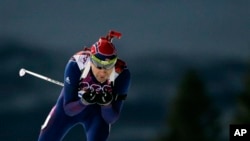 Norway's Ole Einar Bjoerndalen competes on his way to win gold in the men's biathlon 10k sprint, 2014 Winter Olympics, Sochi,Feb. 8, 2014.