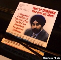 A campaign poster labeled turbaned Sikh Ravi Bhalla as a terrorist.