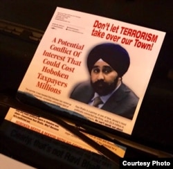 A campaign poster labeled turbaned Sikh Ravi Bhalla as a terrorist.