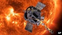 This image made available by NASA shows an artist's rendering of the Parker Solar Probe approaching the Sun. (Steve Gribben/Johns Hopkins APL/NASA via AP)