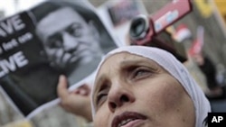 Demonstrators during a demonstration near the UN headquarters in New York against Egyptian President Hosni Mubarak, January 29, 2011