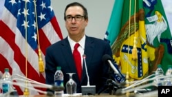 Treasury Secretary Steve Mnuchin speaks during a news conference at World Bank/IMF Spring Meetings, in Washington, April 21, 2018.