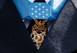 The Medal of Honor hangs around the neck of Medal of Honor recipient Army Staff Sgt. David Bellavia, June 25, 2019.
