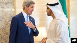 U.S. Secretary of State John Kerry (L) meets with Crown Prince Mohammed bin Zayed Al Nahyan at the Mina Palace in Abu Dhabi, United Arab Emirates, Nov. 23, 2015.