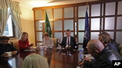 NATO Secretary General Jens Stoltenberg, center, speaks during a media roundtable discussion at Resolute Support headquarters in Kabul, Afghanistan, Wednesday, March 16, 2016. 