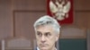FILE - U.S. investor and founder of the Baring Vostok private equity group Michael Calvey, who is under house arrest on suspicion of fraud, attends a court hearing in Moscow, Russia, Aug. 15, 2019.