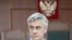 FILE - U.S. investor and founder of the Baring Vostok private equity group Michael Calvey, who is under house arrest on suspicion of fraud, attends a court hearing in Moscow, Russia, Aug. 15, 2019.