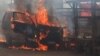 Lubumbashi, dans la commune de la Kenya, un minibus de transport en commun a été incendié, en RDC, le 15 novembre 2017. (VOA/Narval Mabila)