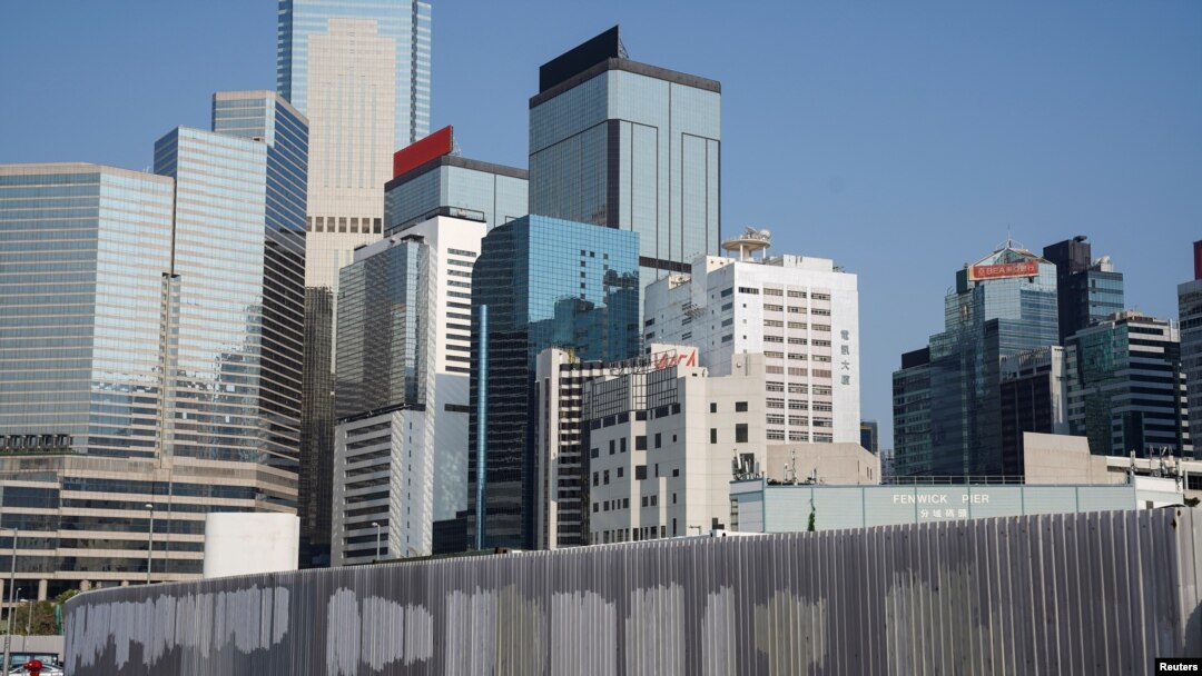 FILE - Graffiti has been removed off a fence in Hong Kong's financial district, the site of many 2019 protests, Hong Kong, China, April 23, 2021.