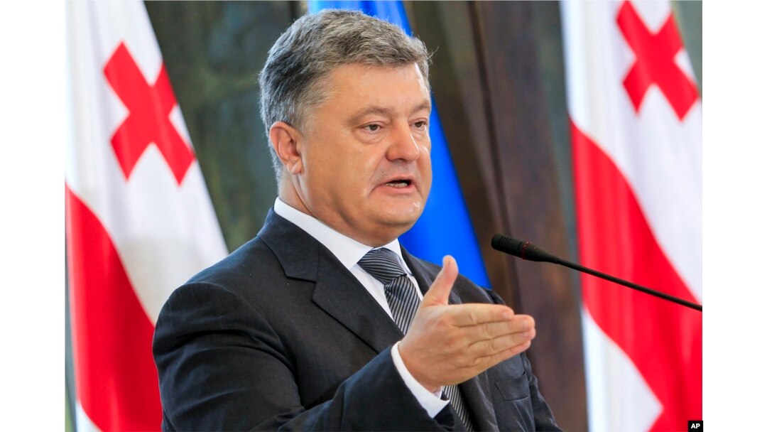 FILE - Ukrainian President Petro Poroshenko speaks at a press conference in Tbilisi, Georgia, July 18, 2017. Poroshenko was on an official visit to Georgia.