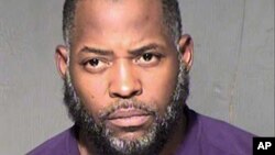 An undated law enforcement booking photo from the Maricopa County, Arizona, Sheriff's Department shows Abdul Malik Abdul Kareem. He is accused of hosting two gunmen at his home to discuss plans for a 2015 attack on a Prophet Mohammad cartoon contest in Texas.