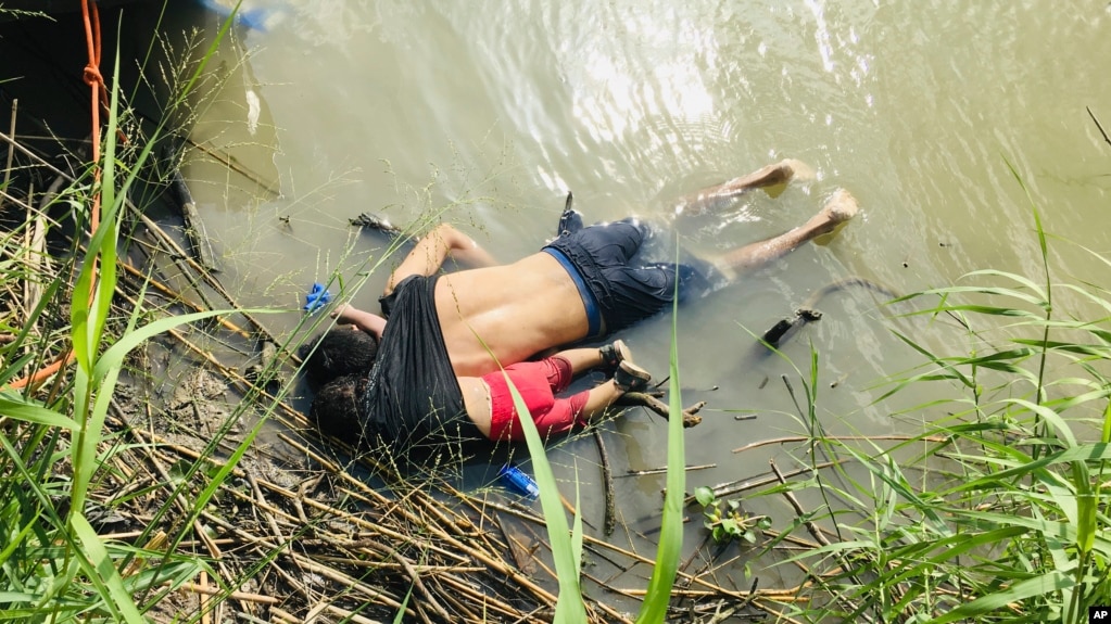 The bodies of Salvadoran migrant Oscar Alberto MartÃ­nez RamÃ­rez and his nearly 2-year-old daughter Valeria lie on the bank of the Rio Grande in Matamoros, Mexico, Monday, June 24, 2019, after they drowned trying to cross the river to Brownsville, Texas. (AP Photo/Julia Le Duc)