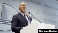 Kosovo's Prime Minister Ramush Haradinaj speaks at a news conference in Pristina, July 19, 2019. Haradinaj said he was resigning because he had been called to a war crimes court in The Hague to answer questions related to Kosovo's independence struggle.