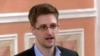 Mantan analis sistem Badan Keamanan Nasional Edward Snowden berbicara di Moskow, 11 Oktober 2013. (Foto:AP)