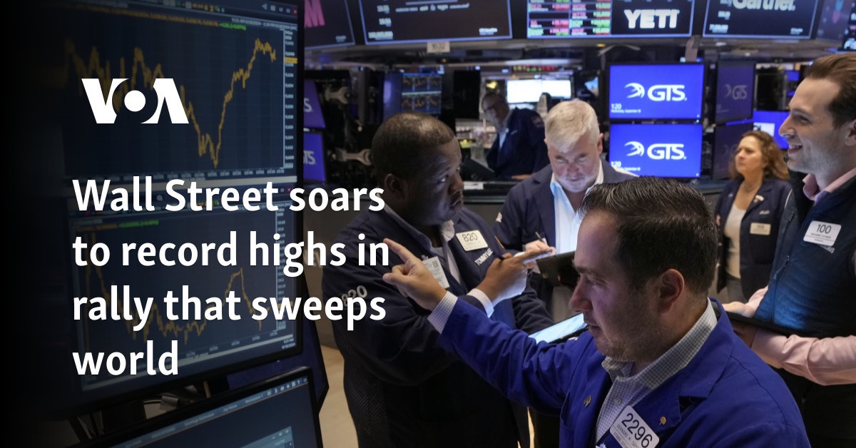 Wall Street soars to record highs in rally that sweeps world