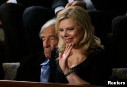 FILE - Sara Netanyahu, wife of Israeli Primine Minister Benjamin Netanyahu, waves while in the House Chamber, March 3, 2015.