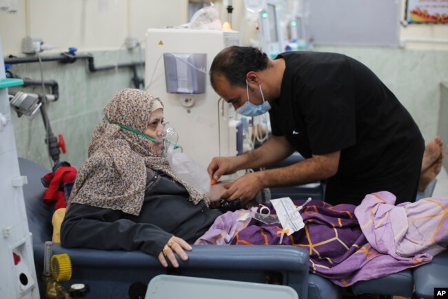 A Palestinian woman receives dialysis treatment in a hospital in Rafah, Gaza Strip, on Jan. 20, 2024.