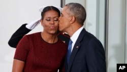 Tsohon Shugaban kasar Amurka Obama da Mai dakin shi Michelle Obama.