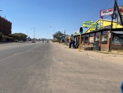 Armed soldiers and police ordered shops to close down early and sealed off all roads leading to the central business district, Harare, July 31, 2020. (Columbus Mavhunga/VOA)
