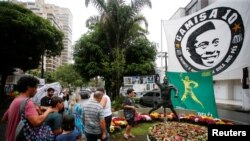 People mourn the death of Brazilian soccer legend Pele, in Santos