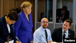 德國總理麥克爾與其他歐盟成員國首腦星期三在布魯塞爾出席早餐會議