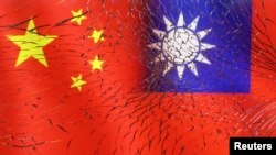 FILE - Chinese and Taiwanese flags are seen through broken glass in this illustration photo taken April 11, 2023.