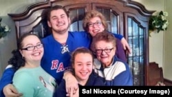 Sal Nicosia with his mom, Caroline, and family members.