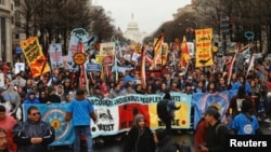 Indigenous leaders participate in a protest march and rally in opposition to the Dakota Access and Keystone XL pipelines on October 3, 2017.