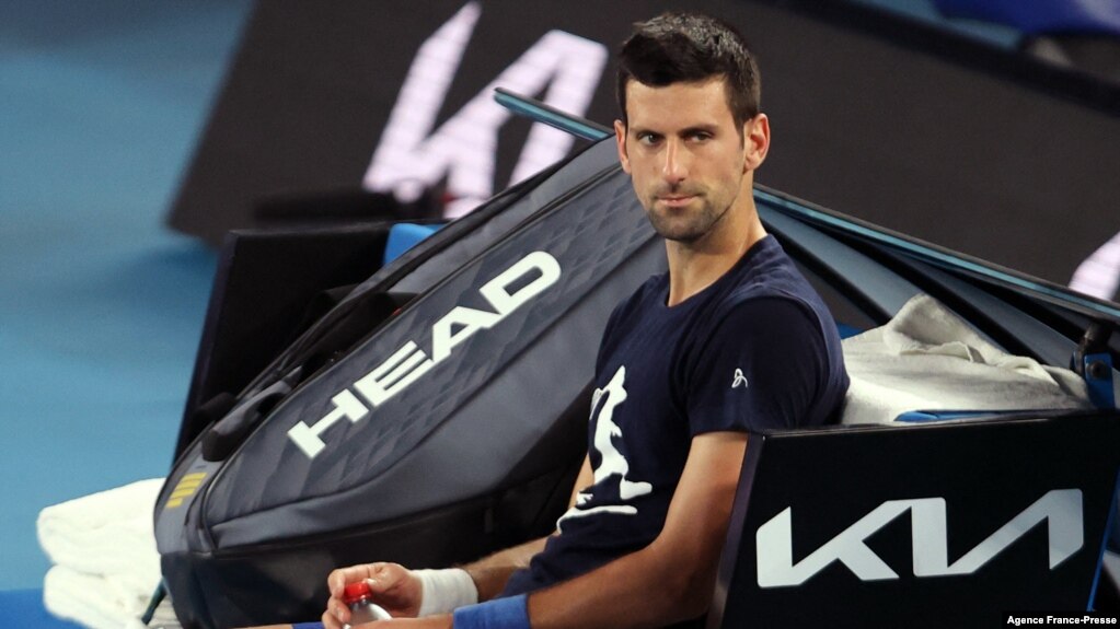 Novak Djokovic of Serbia attends a practice session ahead of the Australian Open tennis tournament in Melbourne on Jan. 14, 2022. (Photo by MARTIN KEEP / AFP)