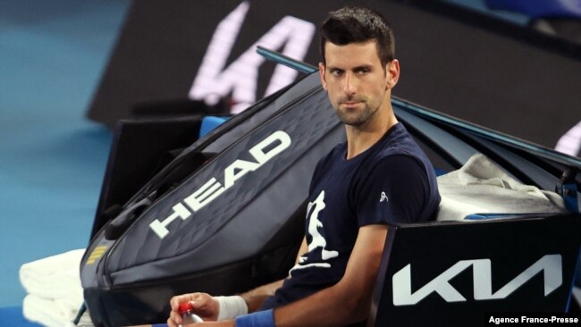 Novak Djokovic of Serbia attends a practice session ahead of the Australian Open tennis tournament in Melbourne on Jan. 14, 2022. (Photo by MARTIN KEEP / AFP)