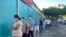 Varias personas hacen fila para votar en las elecciones generales de Nicaragua, el domingo 7 de noviembre del 2021, en Managua. Voz de América.
