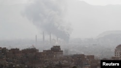 Smoke rises during a battle between forces loyal to former Yemeni President Ali Abdullah Saleh and Houthi fighters, in Sana'a, Yemen, Dec. 2, 2017.