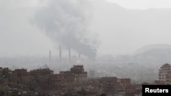 Smoke rises during a battle between forces loyal to former Yemeni President Ali Abdullah Saleh and Iran-backed Houthi fighters, in Sana'a, Yemen, Dec. 2, 2017. 