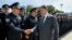 Ukrainian President Petro Poroshenko greets police officers at a swearing-in ceremony in Kyiv, Ukraine, July 4, 2015. 
