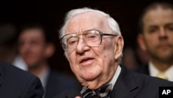 FILE - Retired Supreme Court Justice John Paul Stevens prepares to testify on the ever-increasing amount of money spent on elections as he appears before the Senate Rules Committee on Capitol Hill in Washington, April 30, 2014.