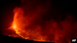 Lava flows from a volcano on the Canary island of La Palma, Spain on Oct. 2, 2021. An erupting volcano on the Spanish island off northwest Africa has blown open another fissure on its hillside.