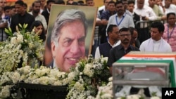 People pay homage to Indian business leader Ratan Tata who died on Wednesday night, in the lawns of the National Centre for the Performing Arts (NCPA), in Mumbai, India, Oct. 10, 2024. 