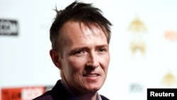 FILE - Scott Weiland poses during the 10th annual "Classic Rock Roll of Honor" awards in Los Angeles, Calif., Nov. 4, 2014. 
