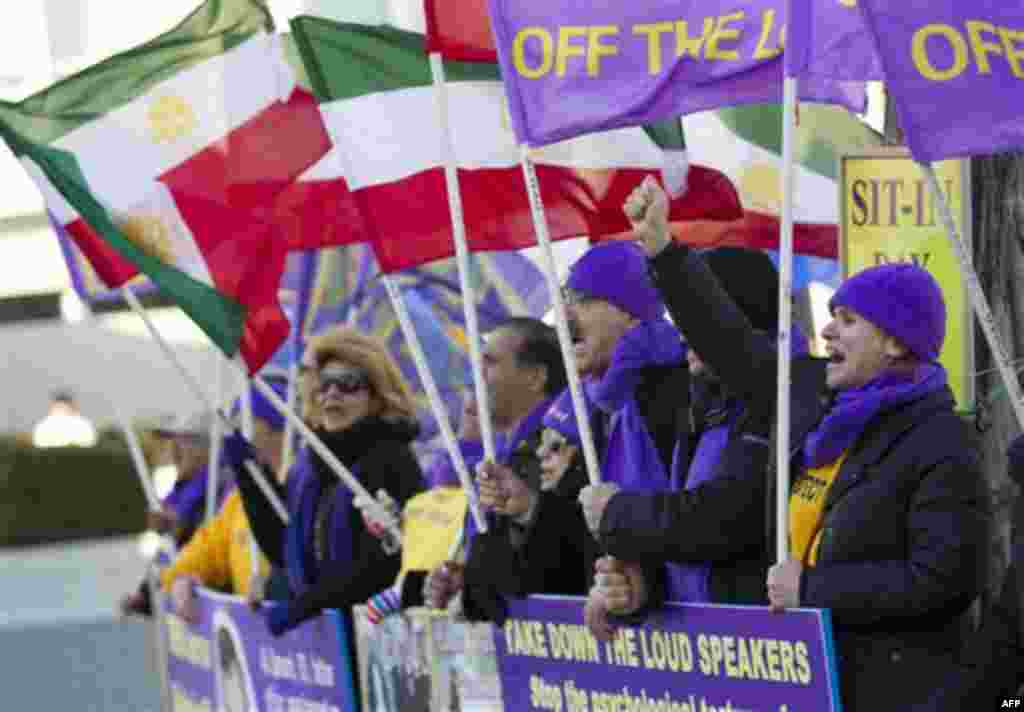 Iranian-American demonstrators gather outside of the State Department in a show of support for protests in Iran on Monday, Feb. 14, 2011, in Washington. (AP Photo/Evan Vucci)