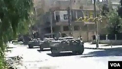 Tank sekirite siryen yo nan lari Deir el-Zour