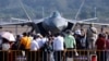 FILE - Visitors to the 15th Air Show in Zhuhai, Guangdong, China, view the Chinese Air Force's J-20 fighter jet, Nov. 12, 2024.