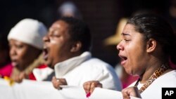 People protest March 8, 2015, in Madison, Wisconsin, following the death of Tony Robinson. Robinson, a 19-year-old black man, died Friday night after being shot by a police officer in an apartment during a confrontation. 