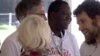 Father Mick Ngundu of Democratic Republic of Congo acted as a 'living book' in Caen, France, during a Living Libraries event. 