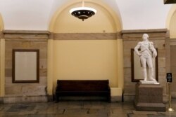 FILE - The spot in the U.S. Capitol where a statue of Confederate General Robert E. Lee had been, sits empty, after the monument was removed to be replaced with a statue of Black civil rights pioneer Barbara Johns, on Capitol Hill, Dec. 21, 2020.