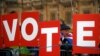 Britain's May Postpones Crucial Brexit Vote 