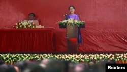 Burma's pro-democracy leader Aung San Suu Kyi delivers her speech at the National League for Democracy party's congress March 10, 2013.