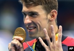 미국 수영대표팀의 마이클 펠프스가 11일 브라질 리우올림픽 개인 혼영 200m에서 금메달을 획득하며, 올림픽 사상 첫 수영 개인종목 4연패의 대기록을 세웠다.