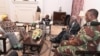 FILE: President Robert Mugabe, center, in a meeting with the ZDF Commander General Constantino Chiwenga, South African Minister of Defense Nosiviwe Mapisa-Nqakula (in yellow head wear), Zimbabwe Defense Minister Dr Sydney Sekeramayi and Zimbabwe State Security 