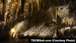 A typical cave at Carlsbad Caverns National Park in southern New Mexico. Stalactites, which hang like icicles from the ceiling, are made up of calcium salts and other minerals deposited by dripping water.